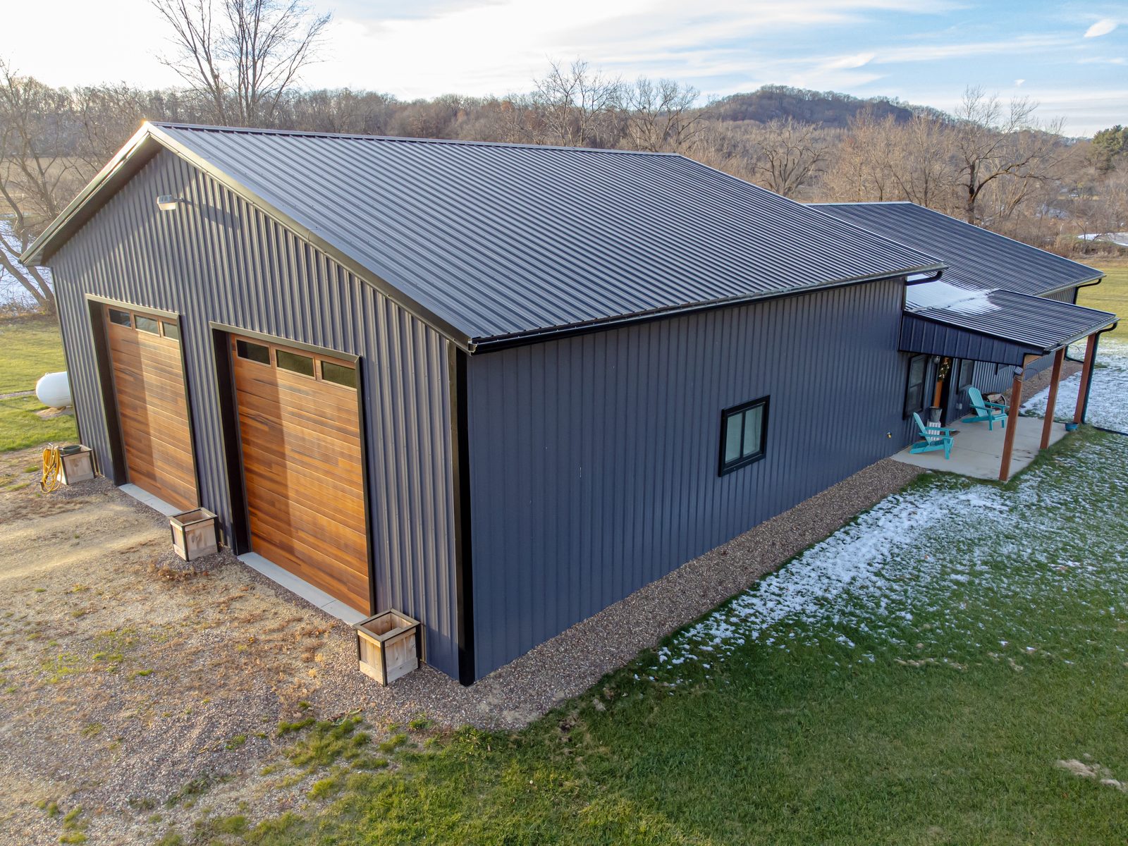 Example of a barndominium with a wide covered porch